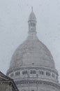 The dome of SacrÃÂ©-CÃâur in a snow storm Royalty Free Stock Photo